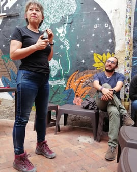 Doris speaking about La Troche beer at Casa de La Paz