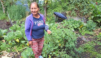 Rosa in her garden in Yunguilla
